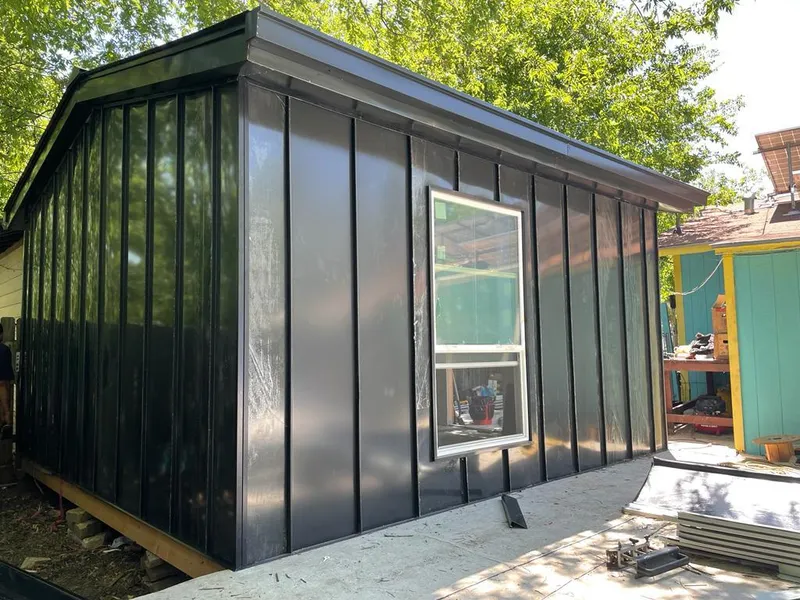 Black standing seam metal wall panels for Roof Inspection in Trotwood