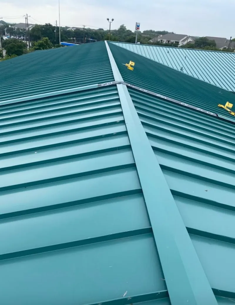 Green commercial metal roof ridge and valley for Metal Roof Repair in Trotwood