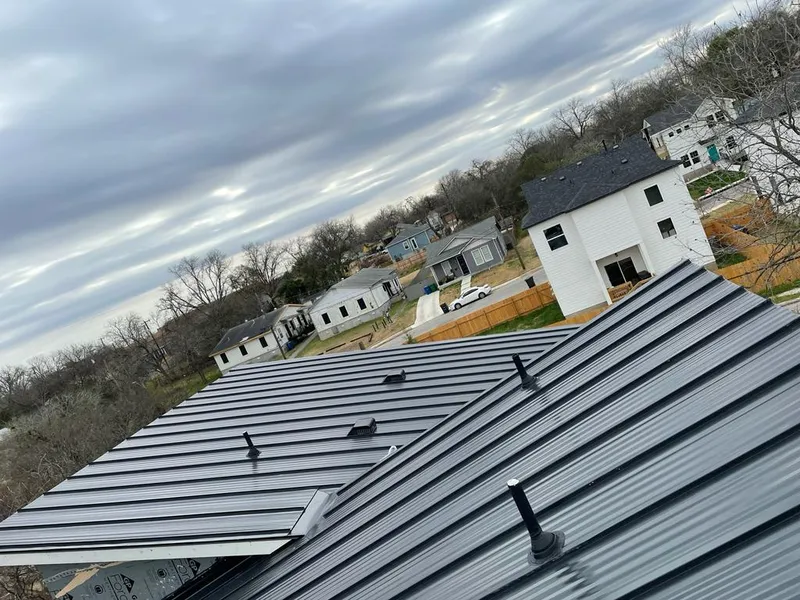 Standing seam metal roof panels with vents for Skylight Repair in Trotwood